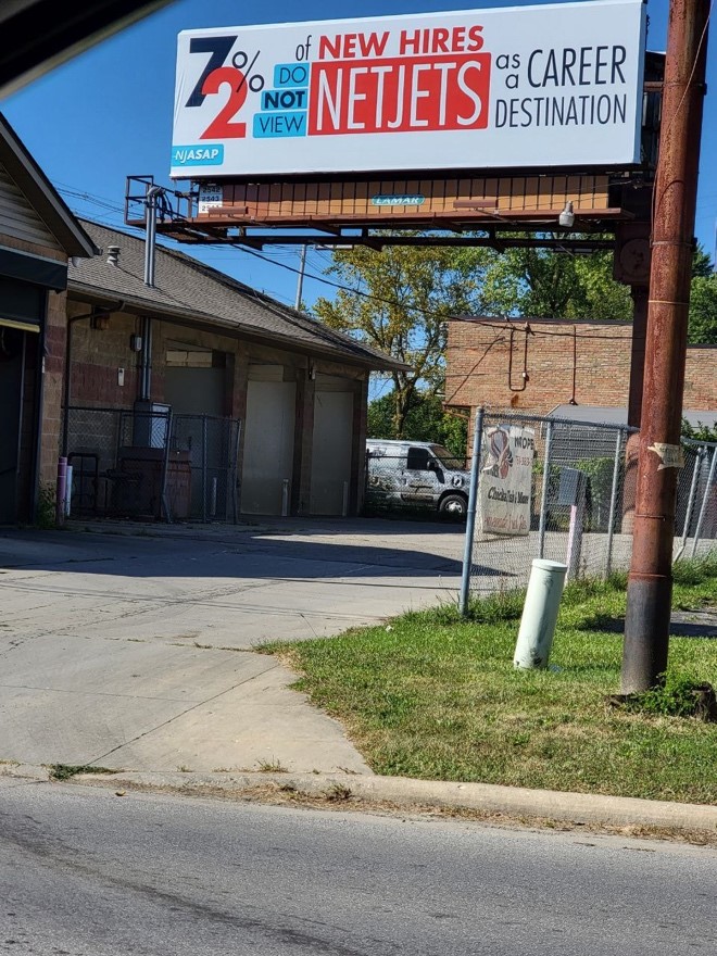 NJASAP's tweet photo. New in CMH: NJASAP has deployed new designs on its billboards located along the drive to #OnlyNetJets’ Headquarters at the intersection of Stelzer and Johnstown as well as the intersection of Stelzer and Agler. // https://t.co/aNmbBTlOz9 // #NotCompetitive #PilotShortage #Aviation #UnionStrong