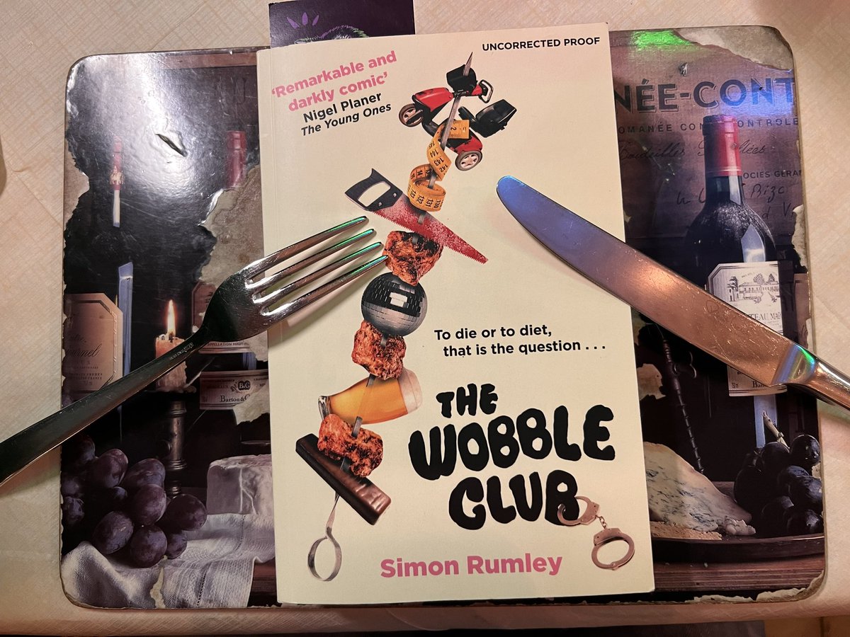Smithyshere's tweet photo. Tucking into @simon_rumley’s debut novel #TheWobbleClub, a darkly funny satire on eating & dieting that fills your belly with laughter. Might be wafer thin too much for Mr Creosote. Out 26 Oct @booksaremybag @CloutComCoUk #debutnovels #fiction #comedy #britishauthors #lovereading https://t.co/6qiXUQjs93