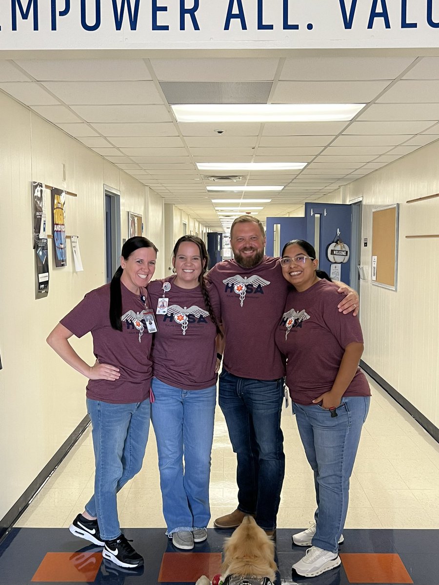 MattWRambo's tweet photo. Finally got our HOSA shirts in the world’s best color - Aggie Maroon. 

Major the school therapy dog is still practicing on how to get in on staff pictures. https://t.co/dex2wB1DVc