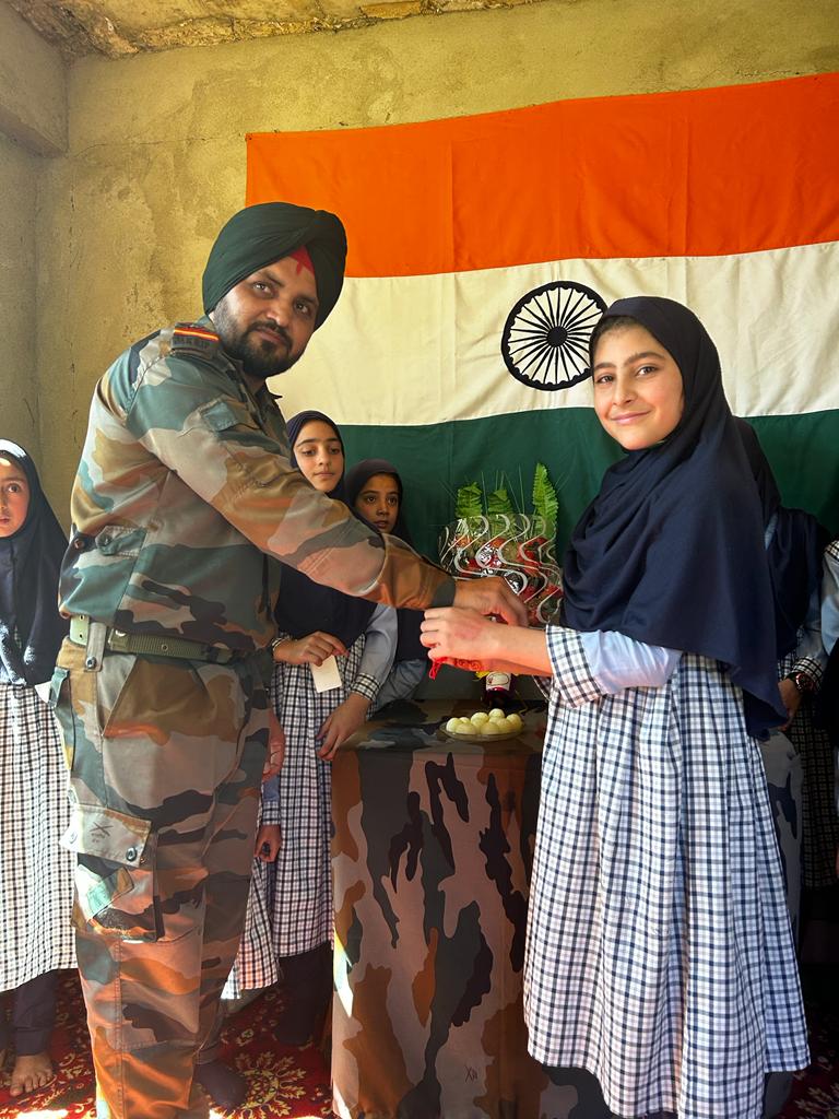 Striking1979's tweet photo. 🇮🇳 Embracing the spirit of unity and love, Panzgam Army Camp celebrated Rakshabandhan with heartwarming gestures. Girls from Lunahare High Sec School tied rakhis to our brave soldiers, showing unwavering support. 🌟🙏 #Rakshabandhan #Unity #Gratitude # https://t.co/g7SLPFcJSY