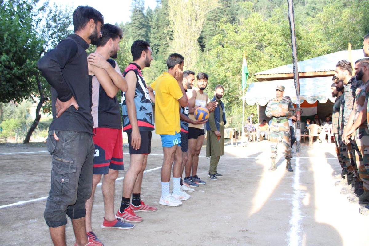 Striking1979's tweet photo. 🏐 Celebrating National Sports Day with a friendly volleyball match! Indian Army joined hands with the local community at Meelyal High School, promoting unity and interaction.  🇮🇳🤝 #NationalSportsDay #Unity #JawanAwaamInteraction #CommunityEngagement https://t.co/qkXPJcYdhp