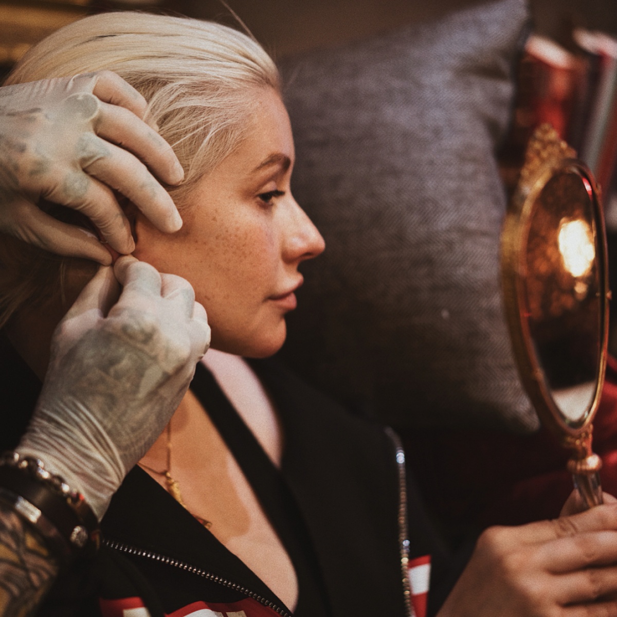 Brian Keith Thompson @bodyelectric working his #piercing magic with #christinaaguilar @xtina. #bodypiercing #bodyart #publicrelationsagency @rickkrusky #bodyelectrictattoo