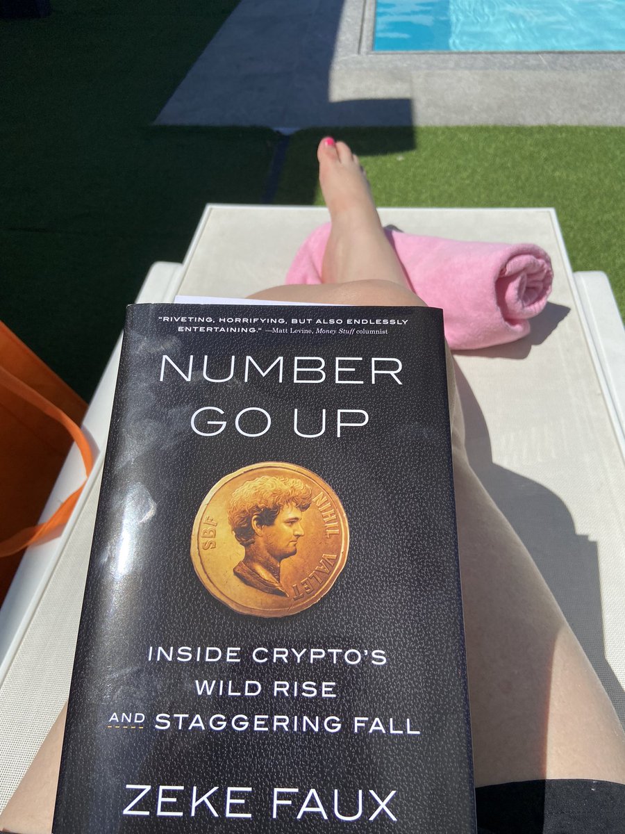 Poolside reading today is “Number Go Up” by @ZekeFaux