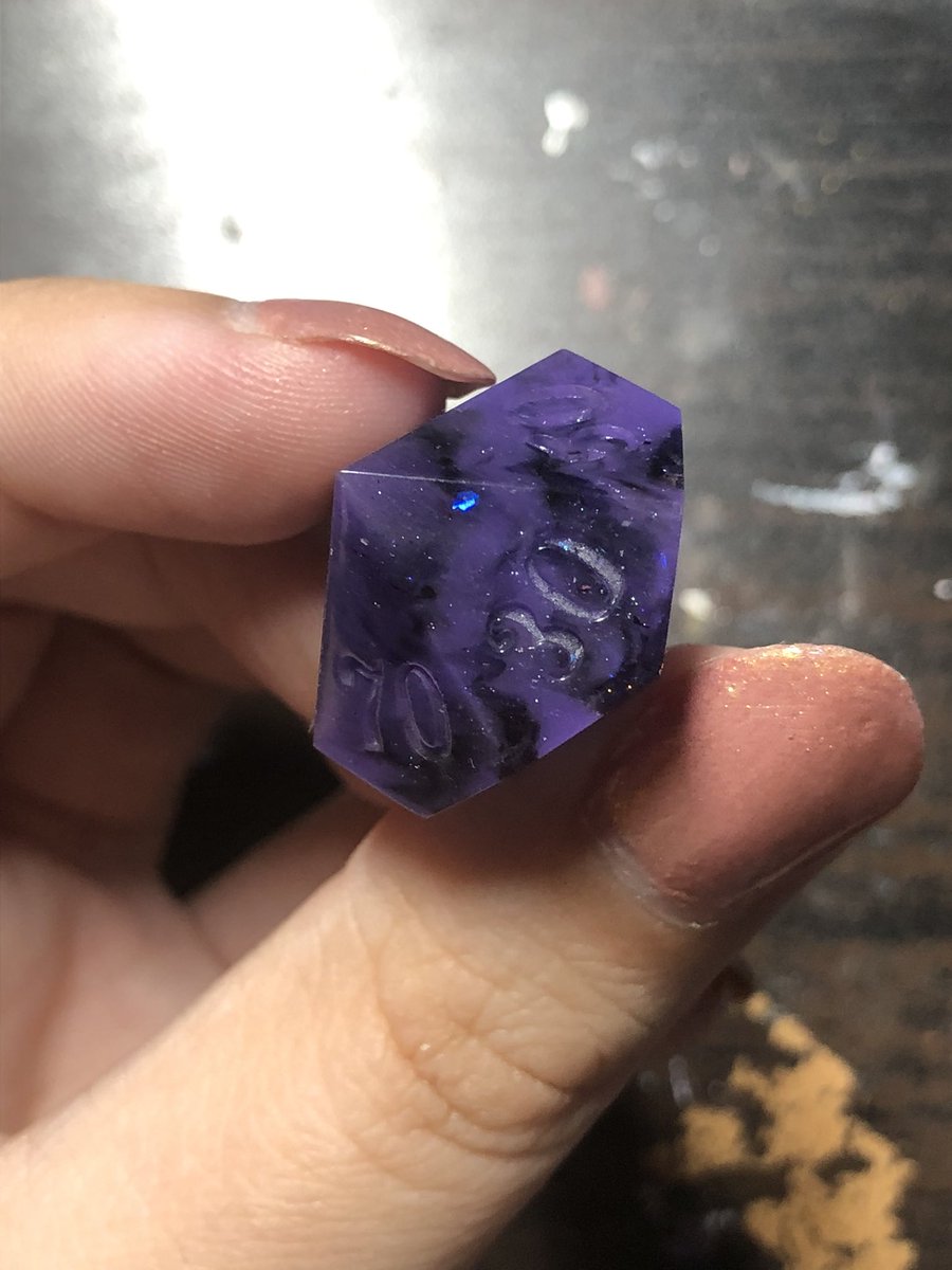 HealersHug's tweet image. This set was a chaotic pour of extra resin from another project. I am surprised that it didn’t come out with voids or bubbles because the resin had been mixed for so long it was already staring to cure by the time I poured this set. 
#handmadedice #dice #diceset #dnd #ttrpg