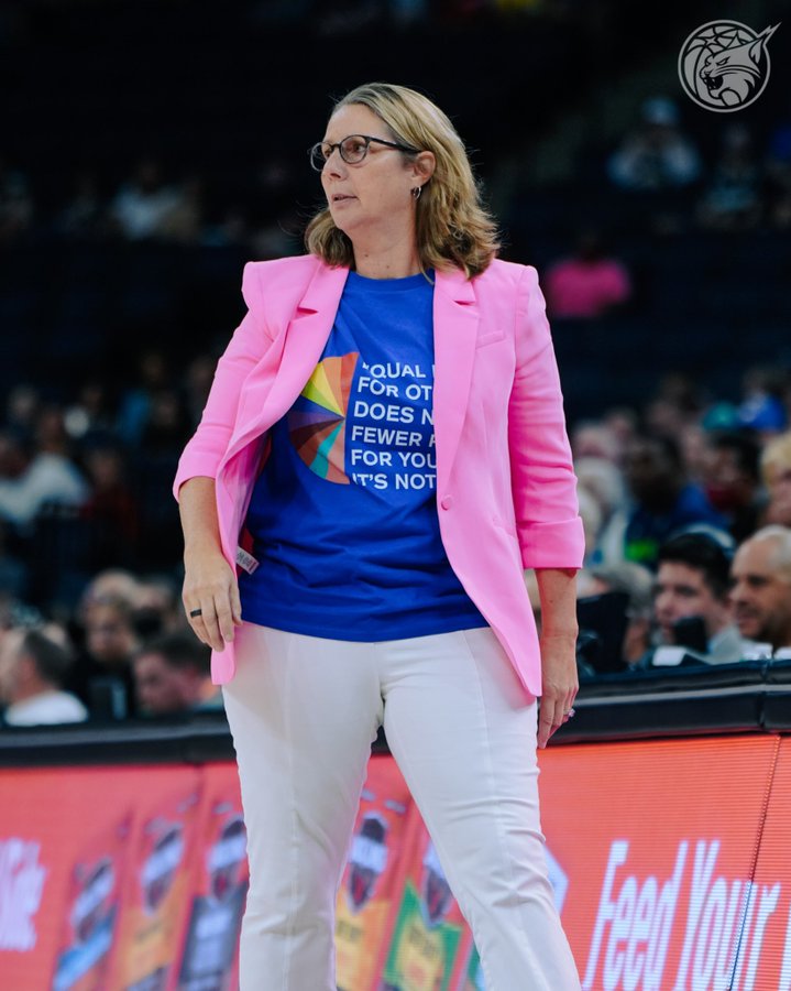 Cheryl Reeve wearing a shirt that says “Equal rights for others does not mean fewer rights for you. It's not pie.”