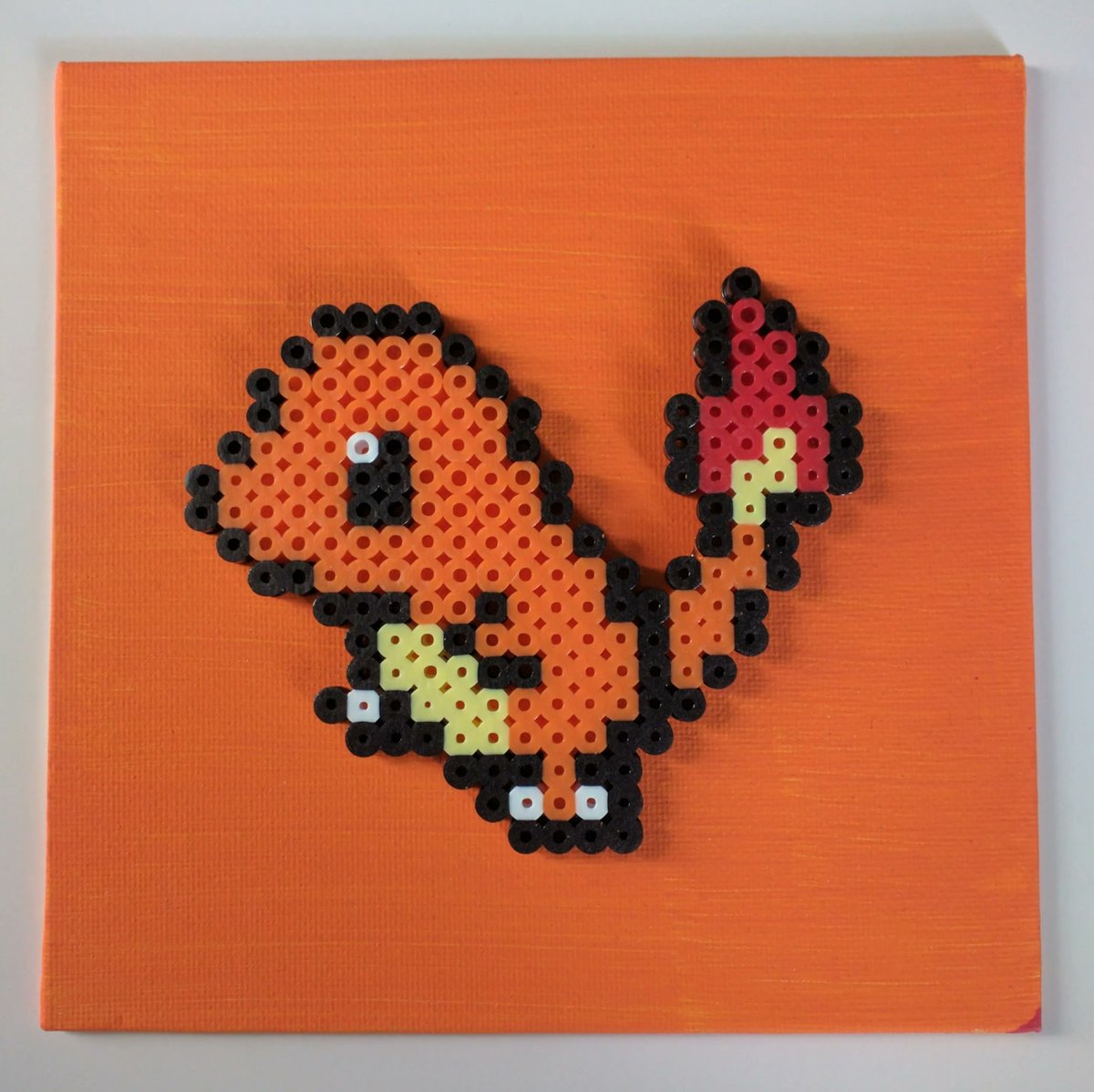 sarah2crafts's tweet photo. 🔥 Bring a touch of nostalgia and pixel-perfect charm to your space with this Charmander pixel wall art! A fiery addition to take you back to the good ol' Pokémon days! 🔥🎮🖼️ #PixelArt #Charmander #PokemonThrowback #smallbusiness #smallcreator https://t.co/td8QpW4uwz
