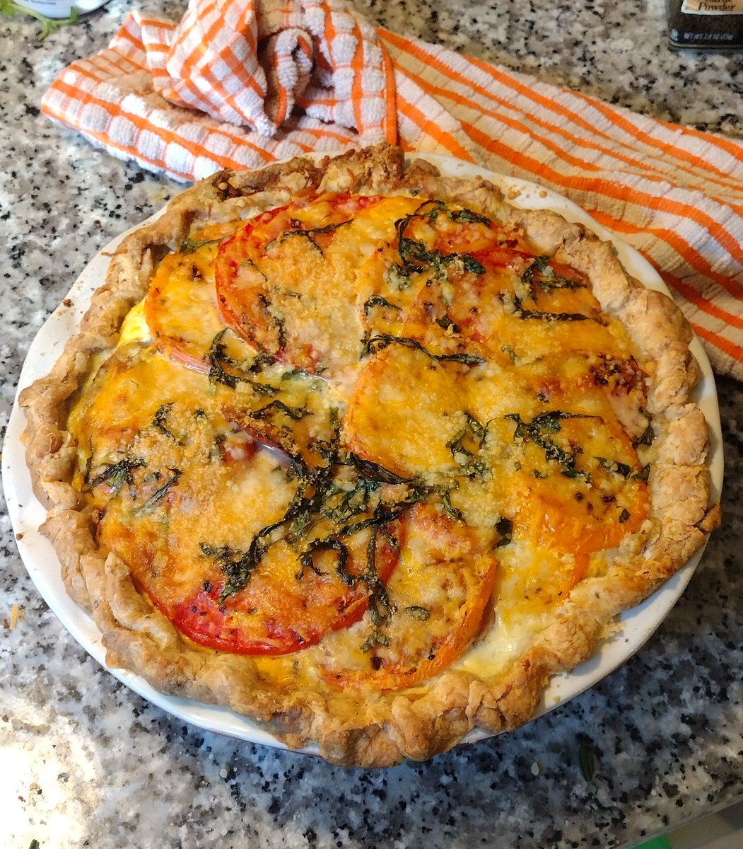 TheButterNutty's tweet photo. The crust got smushed on the edge taking it out from the blind bake so it's a little wonky and I think next time I'll put the basil on top after it bakes but overall I think it looks yummy. https://t.co/lN5agICBMI