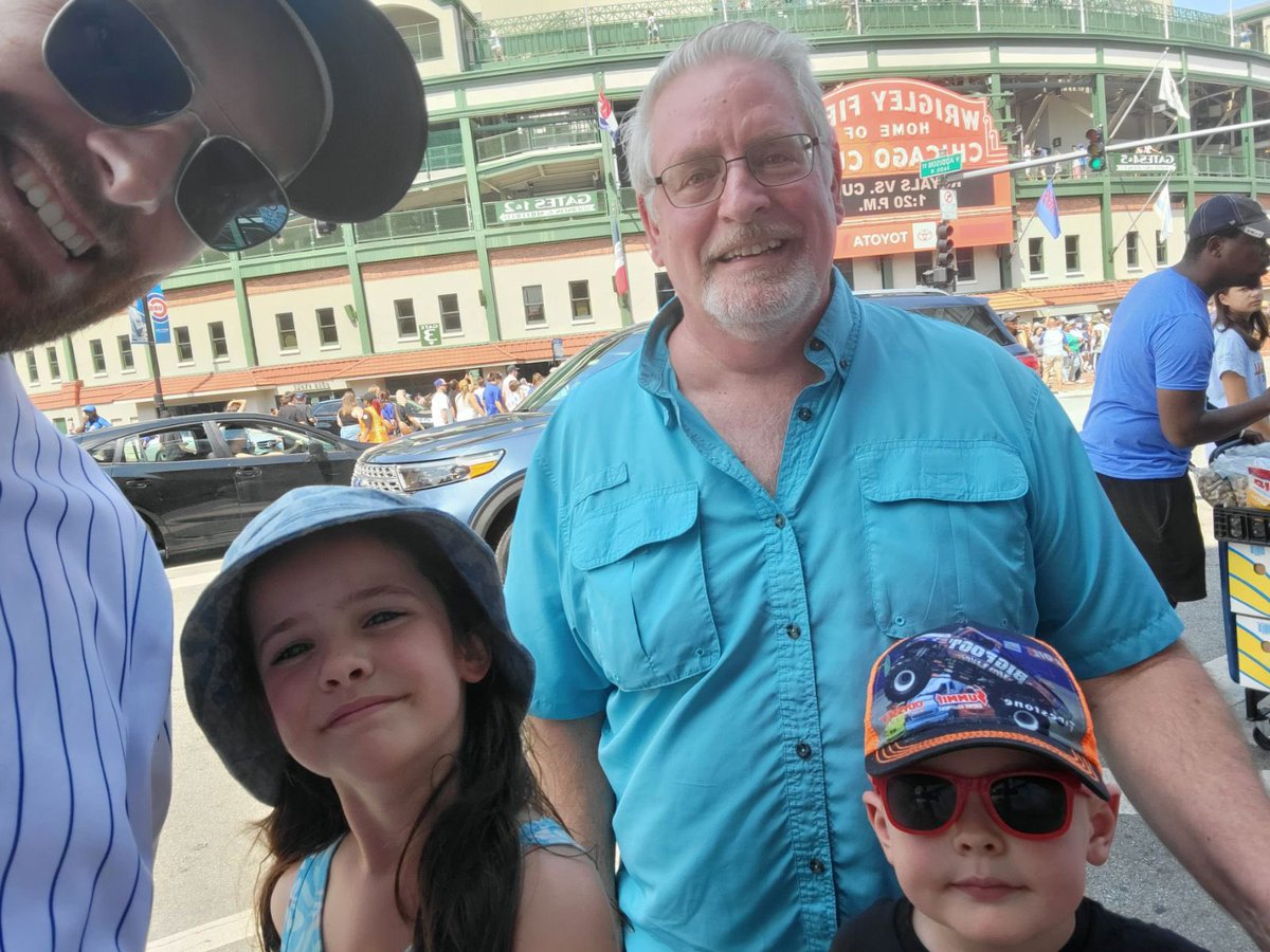 Aemacd's tweet photo. Continuing a family tradition in introducing these two to Wrigley Field. 

Their favorites: Homeruns, hot dogs, new hats

Walked away with a cubs win for @DrSampler https://t.co/m3aFN1qX78