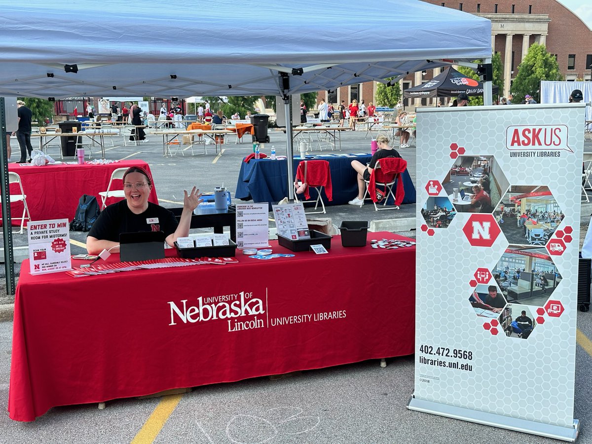 UNL_Lib's tweet photo. We are all smiles at Street Festival. Stop by the Libraries table for free high fives, mini notebooks, and a chance to win a study room for midterms. #bigredwelcome https://t.co/fl6KIoLBlK