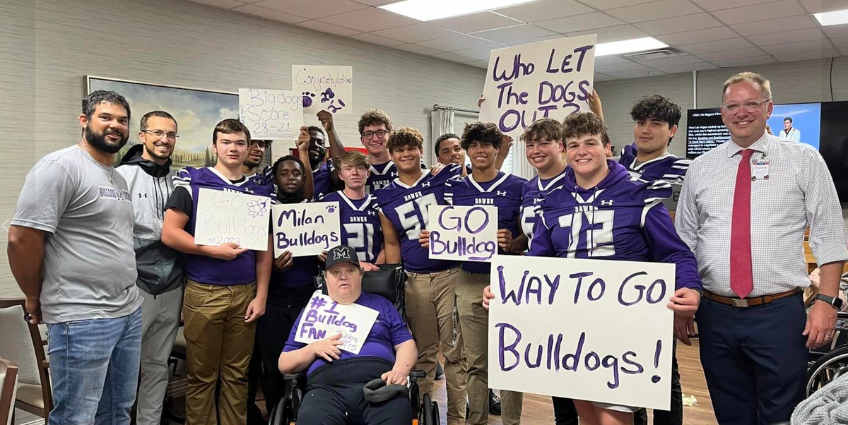The day after their win, the <a href="/MilanBulldogFB/">Milan Football</a> players and coaches take time to visit NHC Healthcare residents. Milan High School alumnus and former Bulldog football manager Billy Jones enjoyed hangin' with the Dawgs and singing the alma mater. #faMily #BIGGERthan