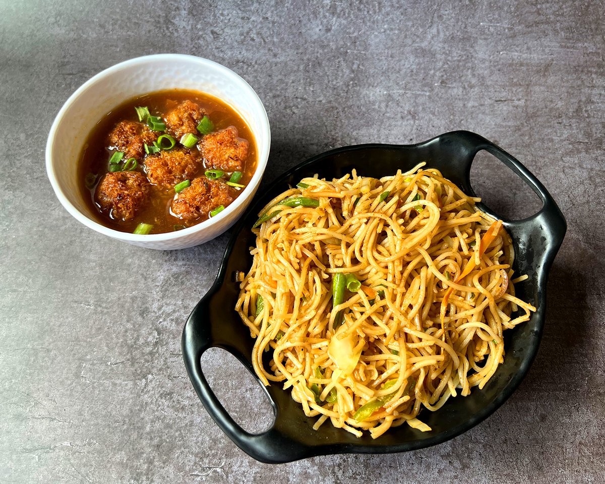 OMKITCHEN_'s tweet photo. One of the ultimate comfort combinations, Veg Noodles with Manchurian 😍 

Made without Ajinomoto in sesame oil, our lip-smacking Chinese combo is a perfect fusion of flavours and textures that hits all the right spots 😋✨

To pre-order: Call at 8882210294

 #omkitchen https://t.co/8jZzodSNpG