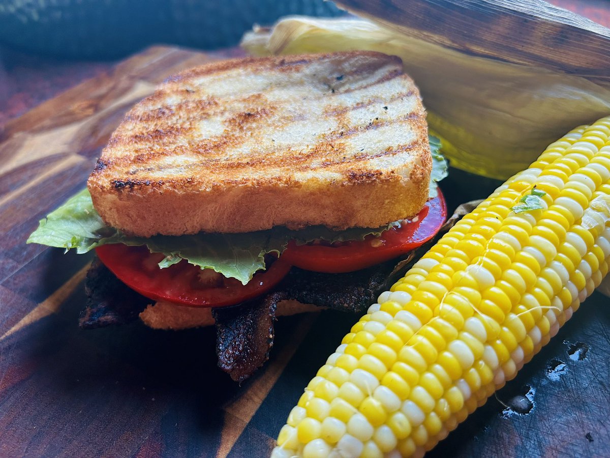 TWags15's tweet photo. First garden tomatoes of the summer can really only mean one meal β¦π
#SummerGrillin #SmokedBacon #FarmStandSweetCorn #SupportLocal #BasilButter #ChipotleMayo #Pecan #Applewood https://t.co/pypBbRMTM8