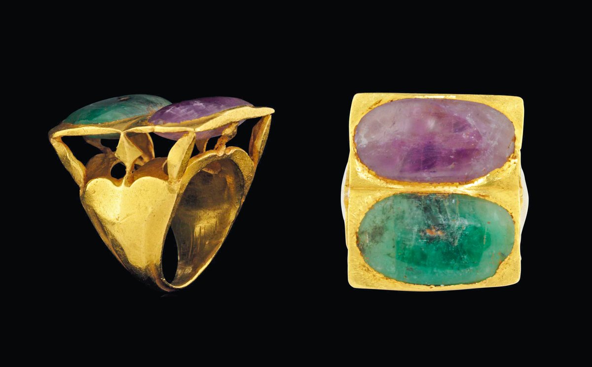 Roman gold ring supporting a square bezel set with an amethyst and a cabochon emerald, c.3rd century AD.