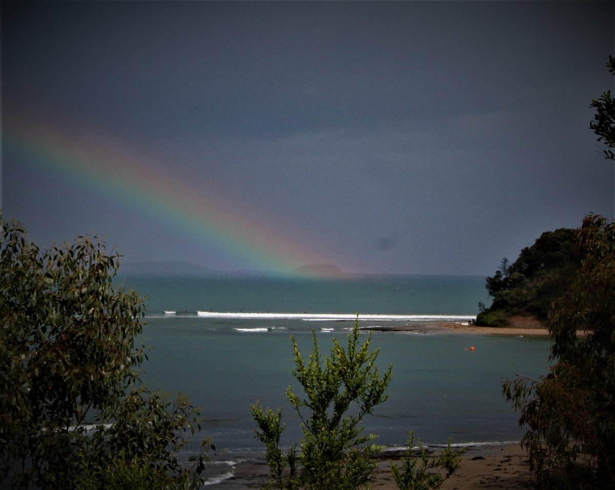 TonySowersby's tweet photo. Rainbow hitting The Nobbies as seen from Point Leo.
A #photograph I took in August 2008.
#rainbow #bunurongcountry
#phillipisland #millowl #westernportbay
#pointleo https://t.co/fFtK7NZBaA