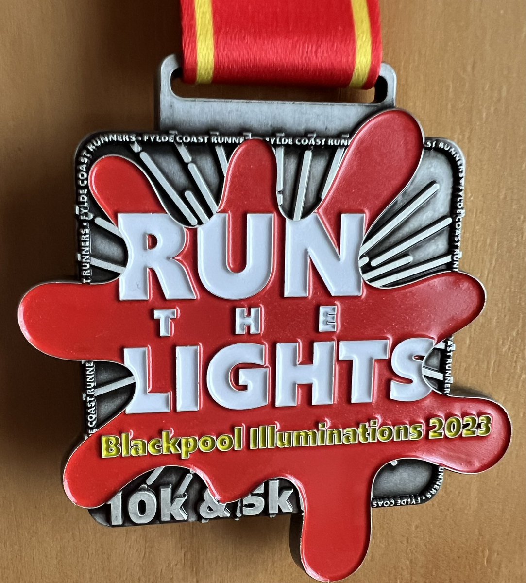 mickhughes75's tweet photo. Saturdays nights award. The funky colour splat, glow in the dark medal for the Blackpool Run The Lights (Illuminations) 2023 🏅#medalmonday #runr #fyldecoastrunners #runner #athlete #trawdenac #teamtac https://t.co/36veFCPfBt