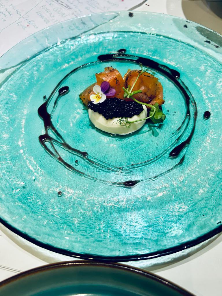 Champagne pan a cotta, gravalax, caviar, sweet blueberry vinegar gel.