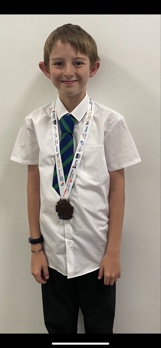 OfficialHGS's tweet photo. 🌟Proud moment! 🎉 

S2 pupil John Paul Rooney participated in the British Transplant Games in Coventry during the summer.  

John Paul won his medal for a sterling performance in Long Tennis and also played table tennis and badminton and completed the Donor run with his dad. 💚 https://t.co/ntKMTFmpHa