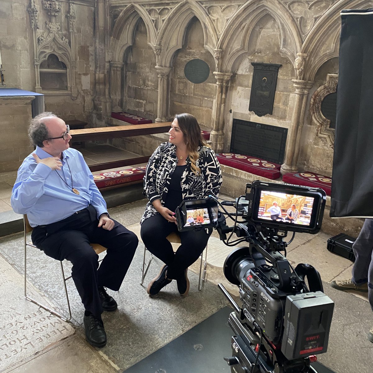 ExeterCathedral's tweet photo. The team from TV and online channel, @HistoryHit , were at #ExeterCathedral last week to film a discussion on the fiery subject of dragons, with classicist @jasmine_elmer &amp; local dragon expert, Dr Daniel Ogden, from the University of Exeter. 
#YourCathedral @UniofExeter https://t.co/ui1hYn2g16