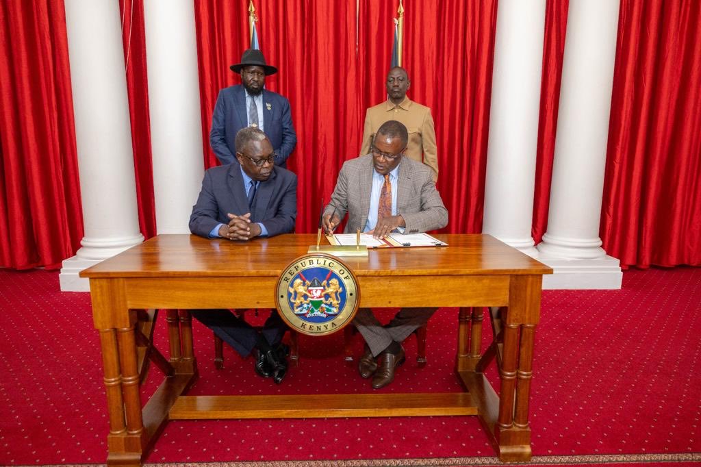 CS Eliud Owalo and Dr. Martin Elia , Minister for Cabinet Affairs signing MoU ay the State House, Nairobi , Kenya