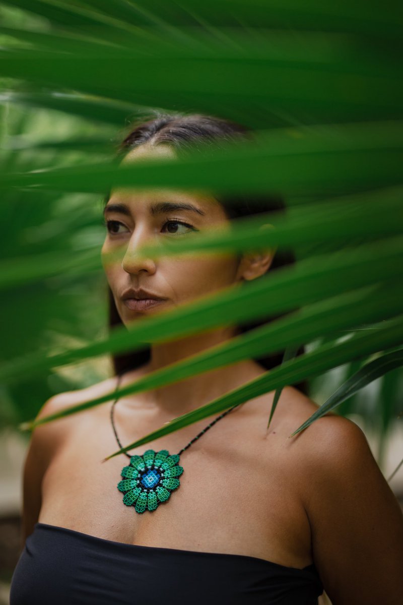 Wearing the 'SELVA' necklace, you carry a piece of art that resonates with your personal journey and allure.🌴 #HandmadeHour #INDIGENOUS mothersierra.com/products/selva…
