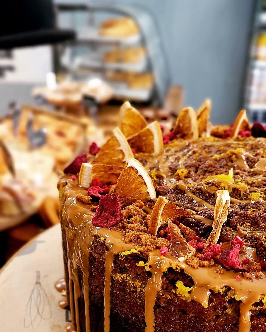 Orange, Caramel &amp; Coconut Cake in our Yatton shop.

#pullinsbakery #yatton #bristolfood #bristolfoodie #dripcakes