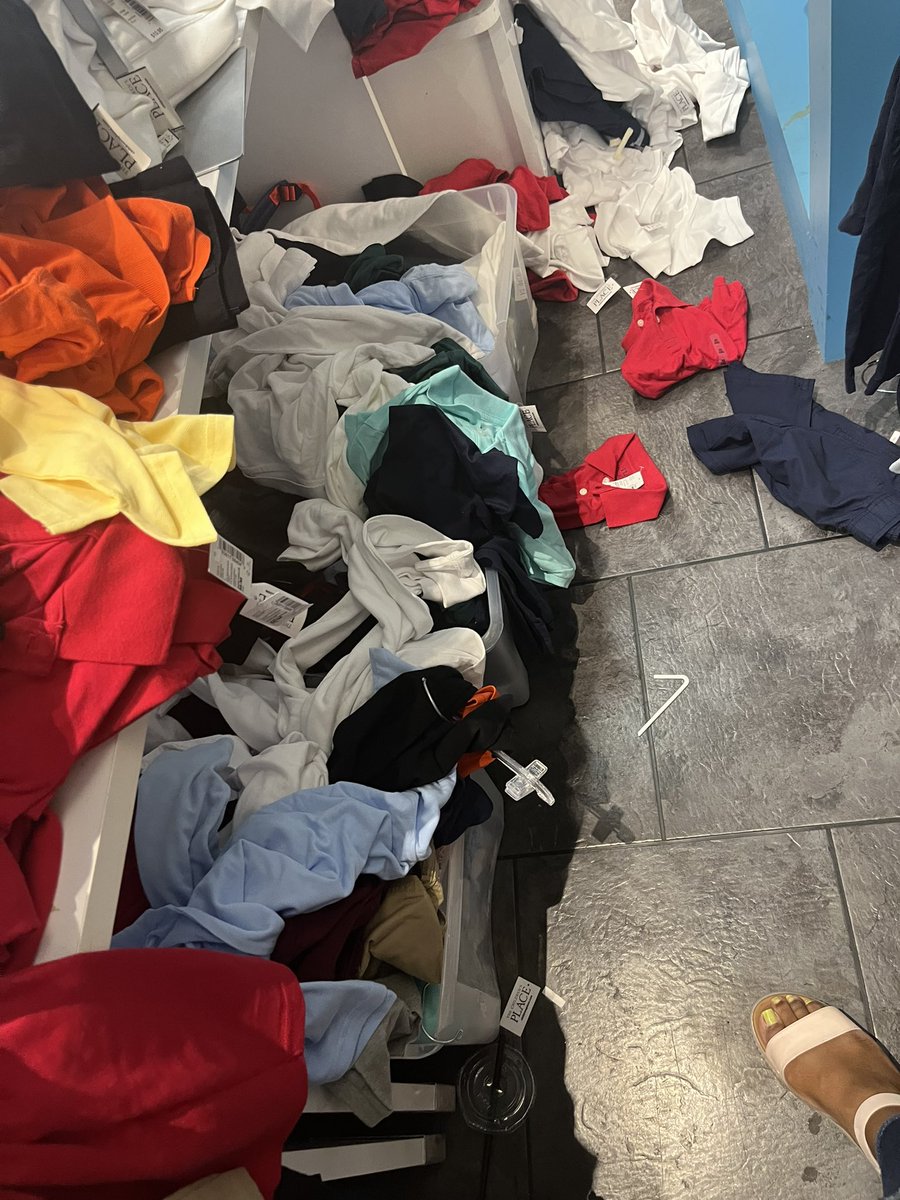 TRAGGGIC's tweet photo. The last @childrensplace store I stopped at was so bad nobody spoke or offered help. Even though entire store looked like this. Mind you this was an hour after the store opened so it's safe to assume this was yesterdays mess https://t.co/P0zFpmc8pJ