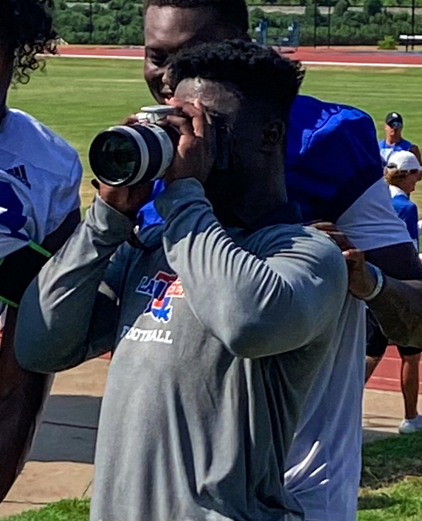 LATechFB's tweet photo. The photographer vs. the shot https://t.co/N6Zx1isnBV