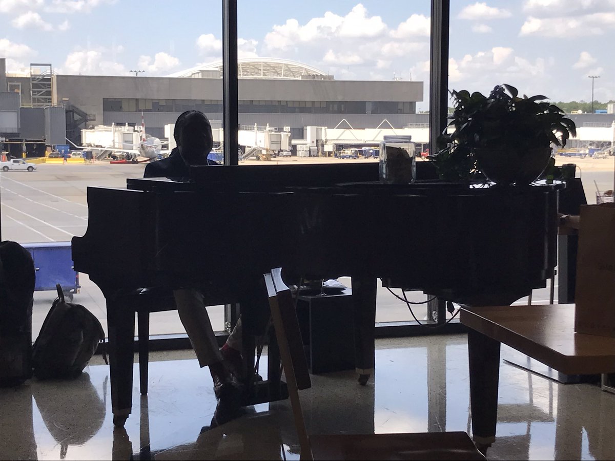NigelJamesWorld's tweet photo. Only a quick stop at Atlanta airport en route to @AwakeningFDN conference in Florida, but it’s been so long since I’ve been here that we had to do this 😀 https://t.co/xJBAg821xL