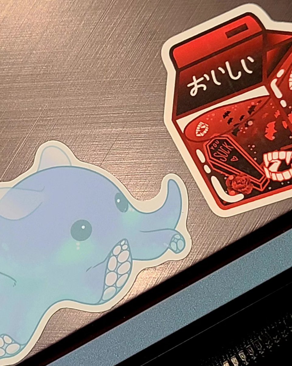 MagicofService's tweet photo. I've once again forgot this account exists but look at the cool stickers I just put on my laptop https://t.co/byb9uuKubQ
