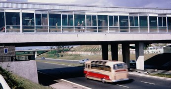 thranged's tweet photo. @JenOrpinPainter @GrimArtGroup Here's another retro scan from 1962 of some motorway architecture.  On a coach trip the best part was the stop at the services. That's our family group at the window. Don't know the location. Any ideas out there? https://t.co/zyVZi92x6M