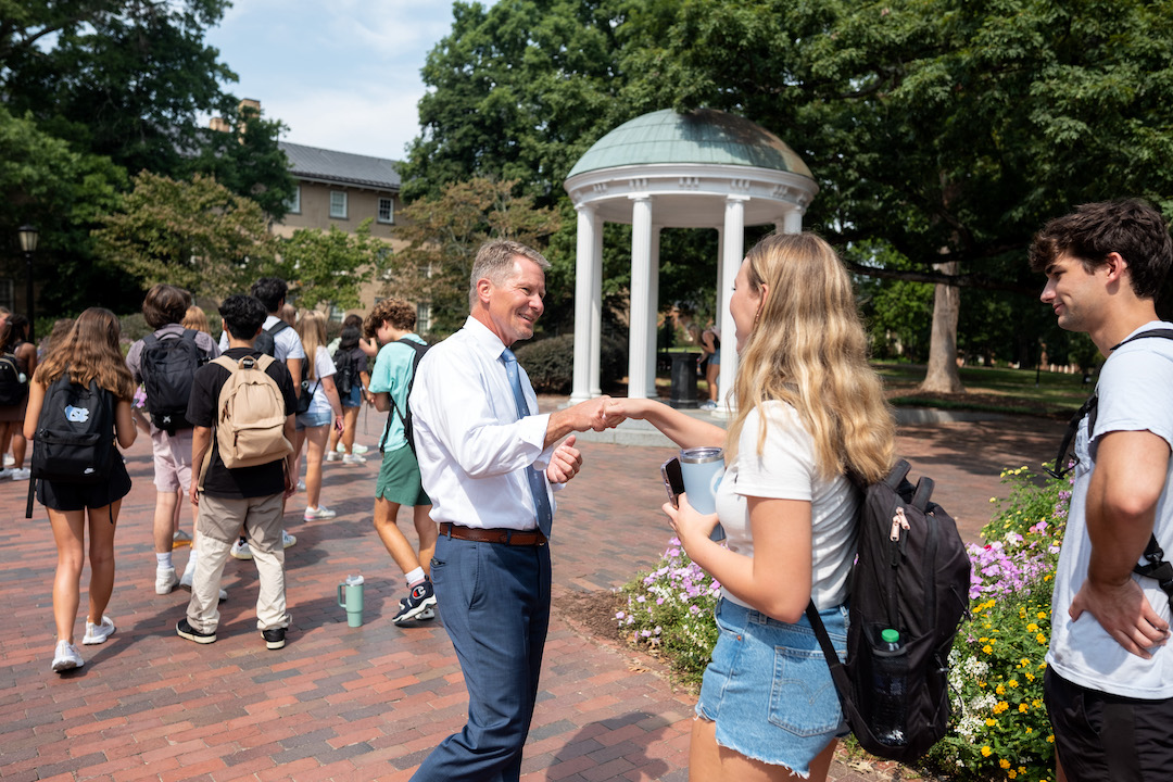 UNC's tweet photo. FDOC visit to Old Well ✅ https://t.co/FK0eDVEuI3