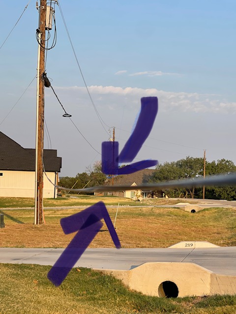Tfromtheheart's tweet photo. @nxlink Weatherford, TX Terrible Service! Draped cable across our yard and driveway to a neighbor's house so low we can't pull our cars out of the driveway. They say not their problem! #safetyhazard #terribleservice https://t.co/zjOSlmumqa