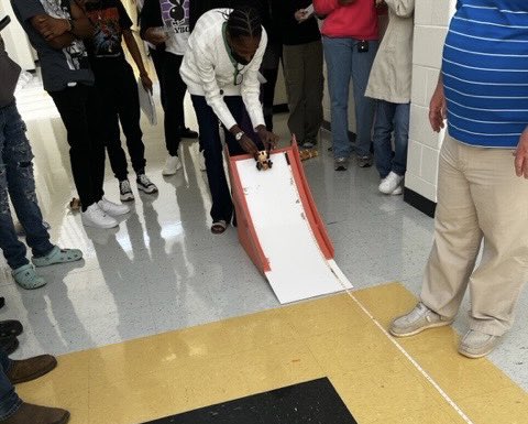 AAS_HCS's tweet photo. How fast can your food (eh, I mean car) fly?  Associates in Brandon Davis’s and Amber Waltower’s science class calculated acceleration using edible cars created by associates! #associateexperience #empoweringtomorrow @DLinnBwell @Toni_Collie @sheppard06 @shaykele78 https://t.co/l4D3y6Mpmq