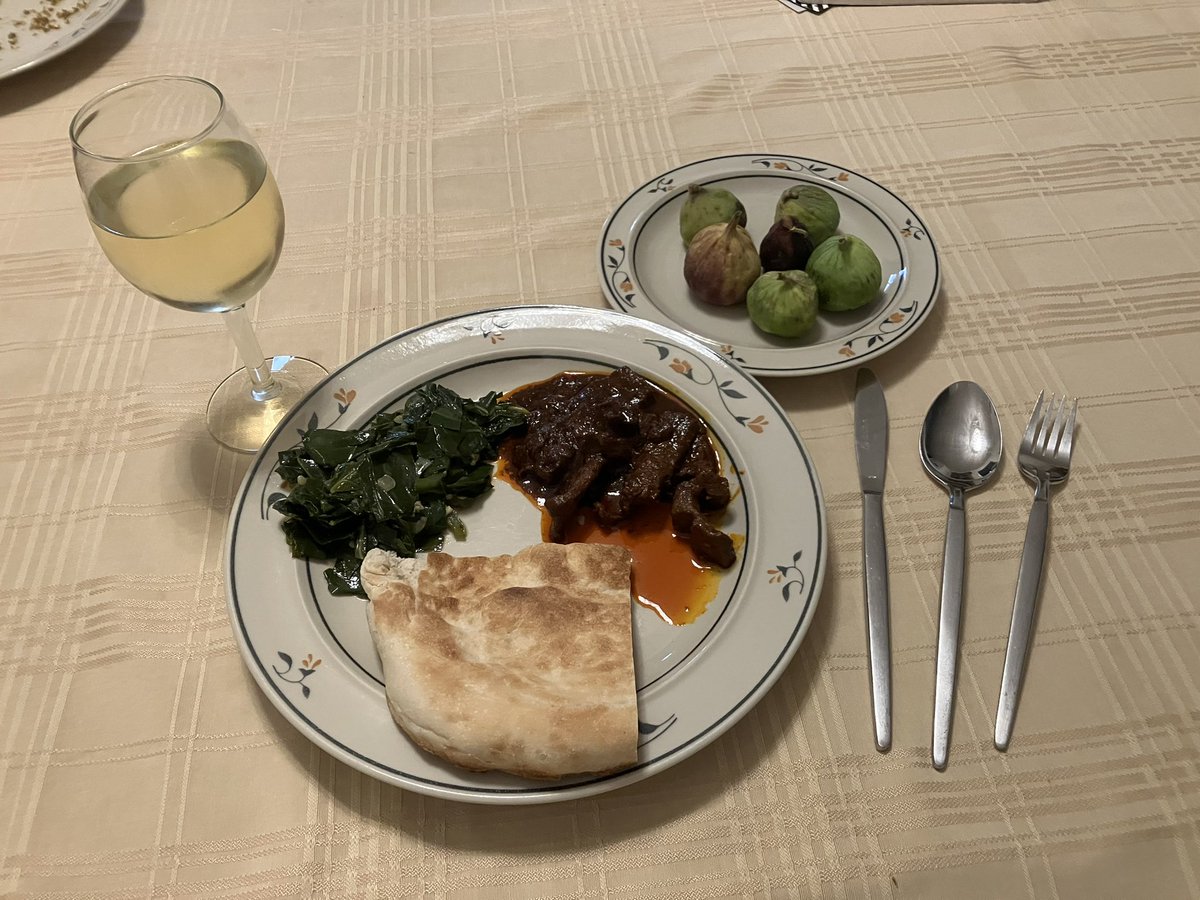 Homemade #ethiopianfood Zilzil Wot, (spicy beef stew) Gomen Wot (collard greens) with some chilled mead (not actually T’ej), with fresh baked Afghani bread (couldn’t get my hands in fresh Injera unfortunately, which I feel quite gauche about).