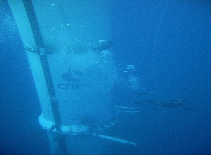 Images taken during the recovery of an Ariane 5 booster in 2007. It's surreal to see the booster underwater. Ariane 5 boosters were recovered periodically for engineering inspections.