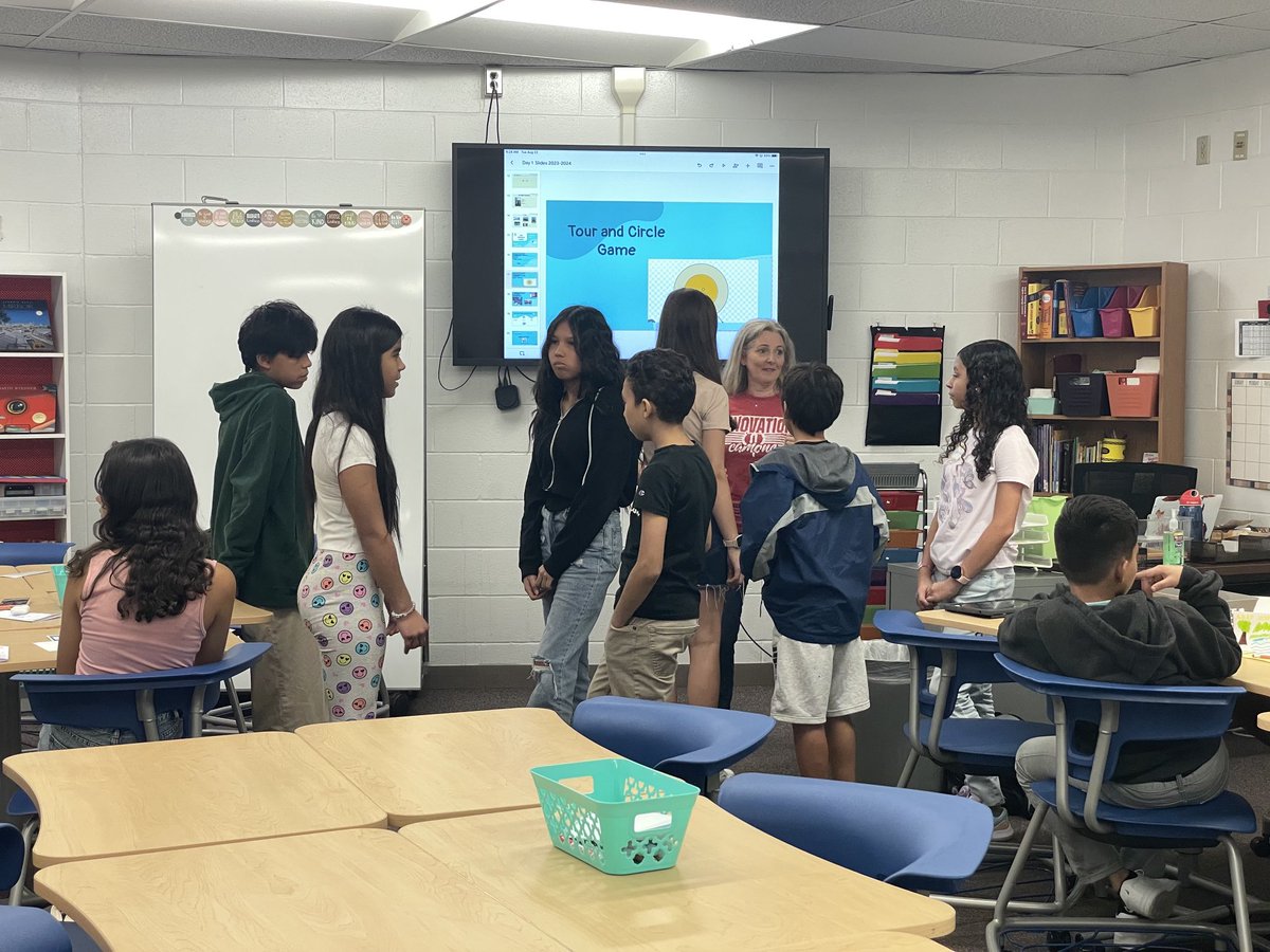 Practicing introducing ourselves at the MS newcomers center - welcome to day 1!! #HCSD1