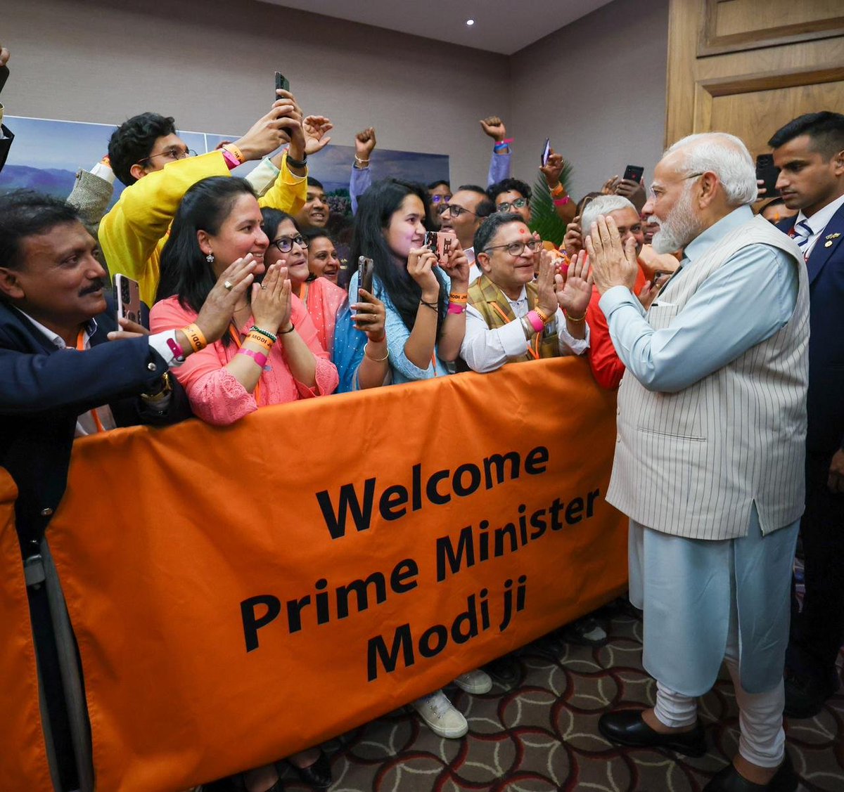 narendramodi's tweet photo. Gratitude to South Africa’s Indian community for the special welcome in Johannesburg. https://t.co/zSQmMrubWE