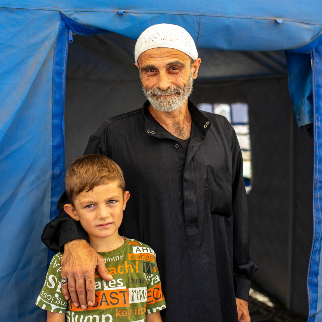 decappeal's tweet photo. Semir, aged 57, a Syrian refugee in Turkey, outside his tent home with his grandson.

Oxfam KEDV, a local affiliate of DEC charity @OxfamGB, have been providing Semir’s family, and families like his, with regular hygiene supplies. 

Support the appeal: https://t.co/267b15rrEn https://t.co/fp1d0HqU2s