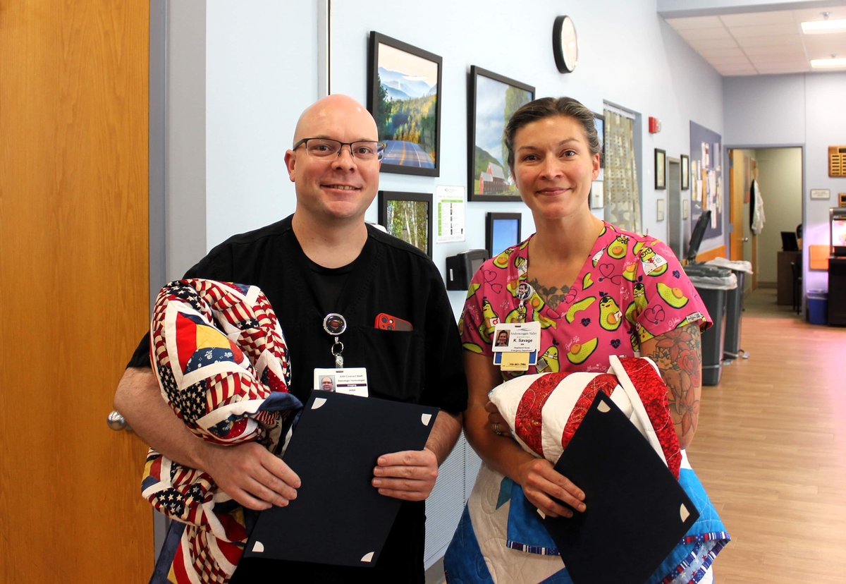 AVHnh's tweet photo. Kate Savage and Wayne Coonts, of AVH's Emergency and Imaging Departments, respectively, were recently awarded Quilts of Valor, as a thank you for their sacrifice in serving our nation.

Thank you to our area quilters for making these beautiful quilts. 

#NHHospitals https://t.co/vUj4eIOB44