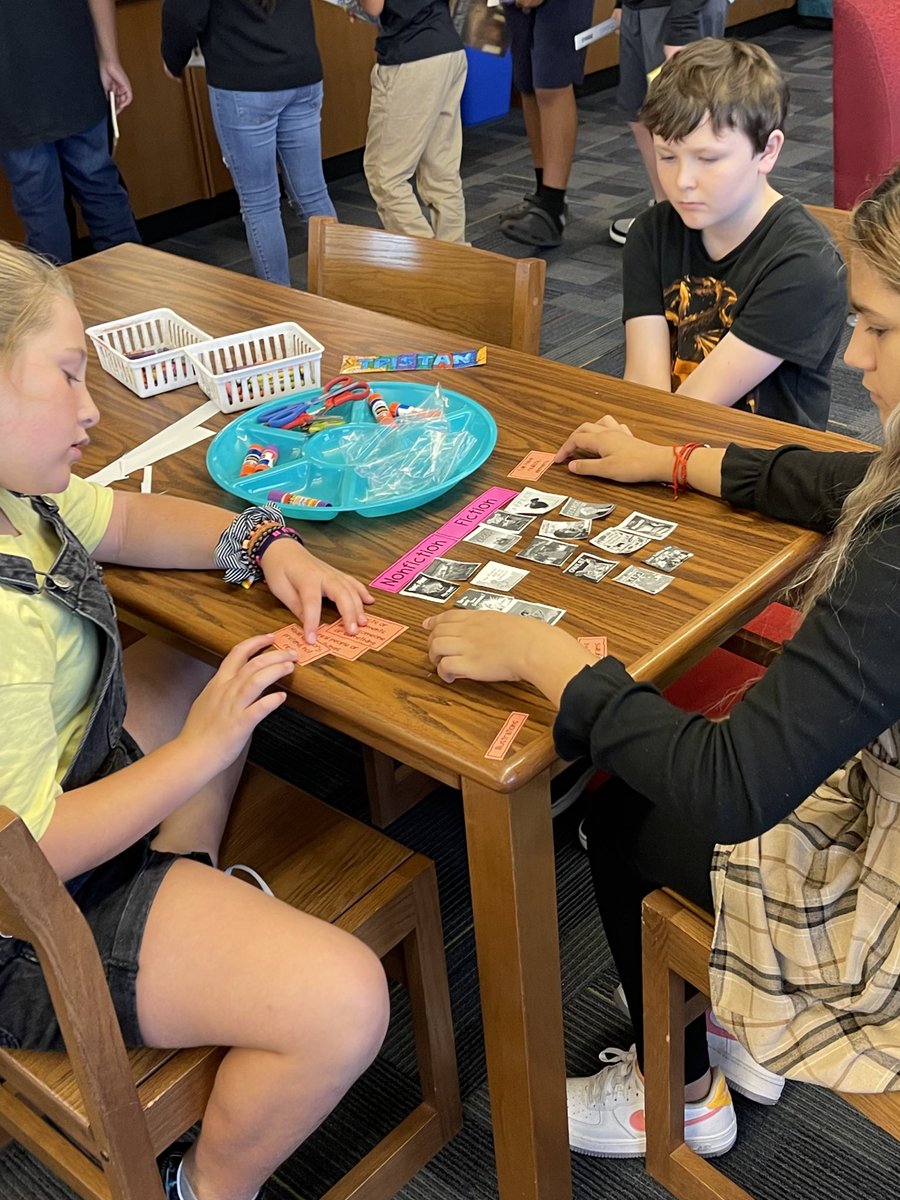 5th grade is working hard on reviewing fiction vs nonfiction by categorizing books and sorting statements! #huskiesinthelibrary