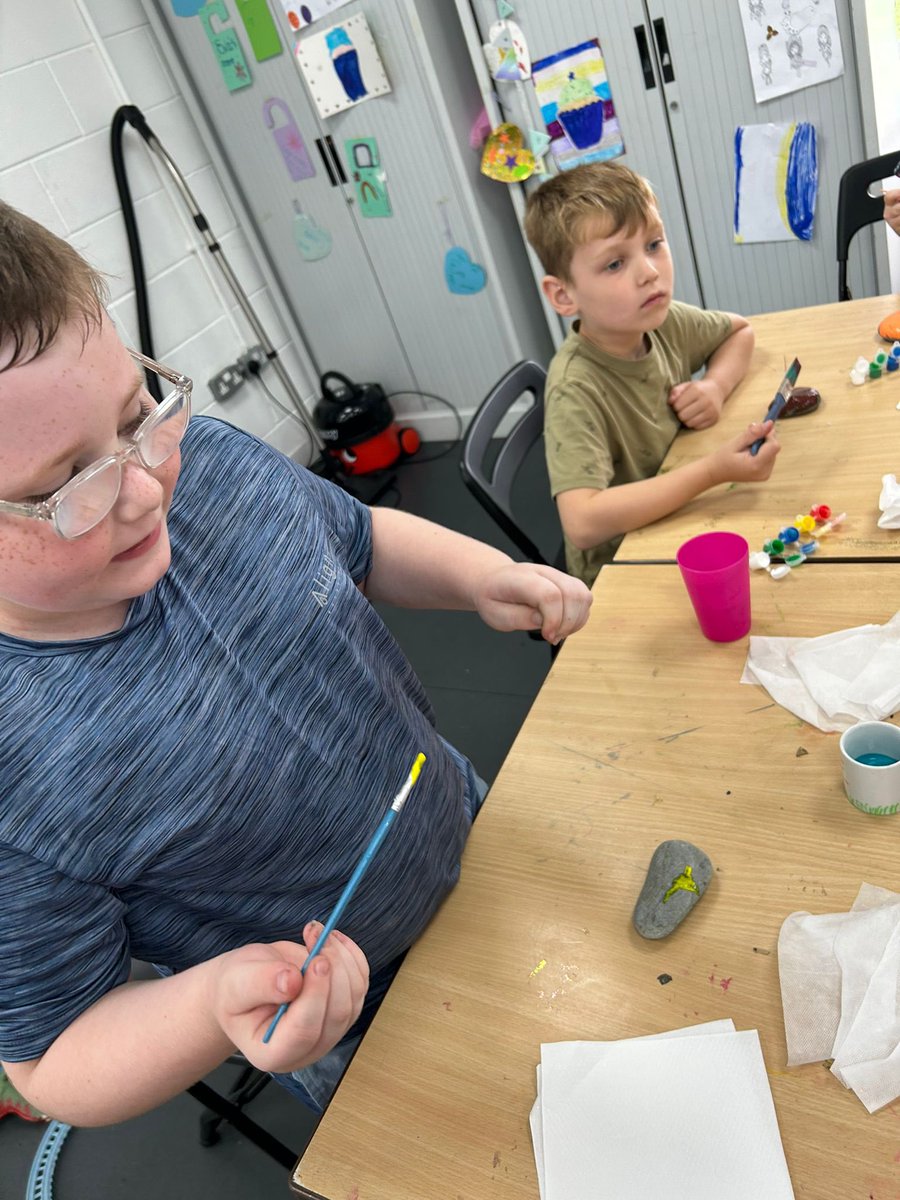 RJCCFoundation's tweet photo. Artist at work today at holiday club stone decoration love how creative our children are thanks to @PlayMpac #HAF2023 https://t.co/lENVbiizBF