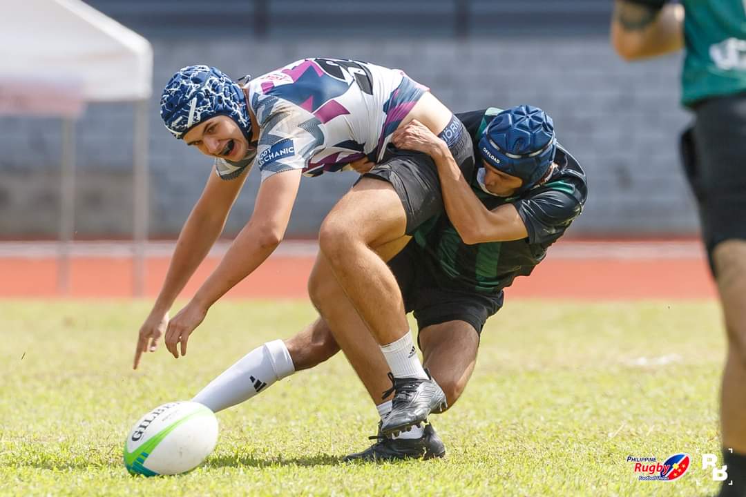 As much as this photo looks cool, it was a penalty for me. But man, I am strongk.

PS. Pao, kapag nabitawan na nila yung bola wag mo na icommit yung tackle.