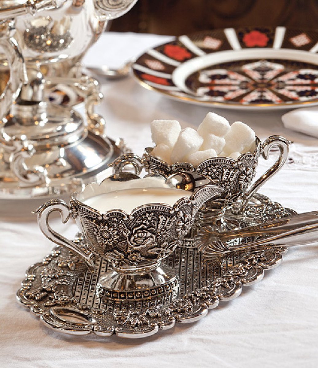 Sometimes the greatest beauty found on a tea table can lie in the petite accoutrements that are occasionally overlooked, like this stunning silver creamer and sugar set. Discover more about "Tea Table Extras" in our current September/October issue on newsstands now.