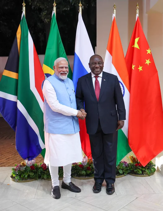 ANI's tweet photo. "PM Modi arrives at the Summer Place to participate in the BRICS Leaders Retreat. Warmly greeted by the host, President of South Africa Cyril Ramaphosa. PM, along with other BRICS leaders will deliberate on global developments and leveraging the BRICS platform to find solutions to global challenges," tweets  MEA spokesperson Arindam Bagchi

(Pic Source: Twitter handle of MEA spokesperson Arindam Bagchi