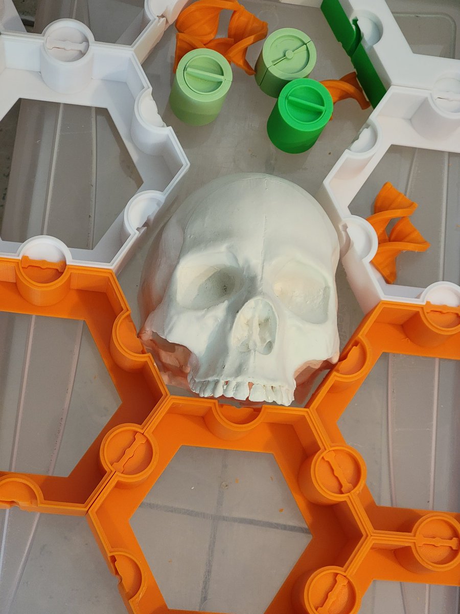 I realized one of my skulls just barely fits the gap. I might do something with that when I get back to this project.