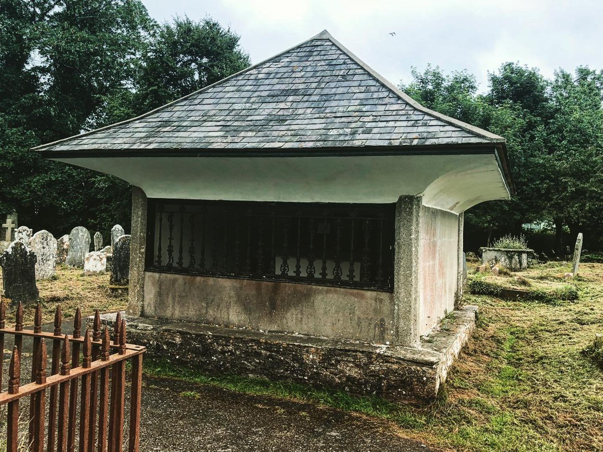 The  Devil’s Grave in Buckfastleigh.  It is said that if you stick your  fingers between the bars he will bite your fingers off (he doesn’t).  It  is also said that if you run around the building (widdershins) thirteen  times then he will appear.