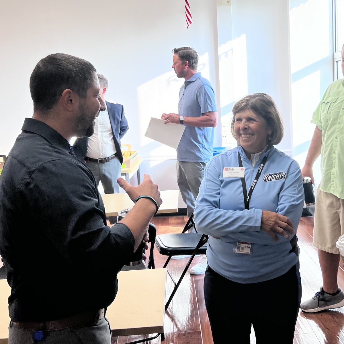 District214's tweet photo. Coffee and conversations. @ScottRoweEdD and Board President Alva Kreutzer enjoyed connecting with staff at @KnightsofPHS! #214firstdays https://t.co/P8VH36esHX