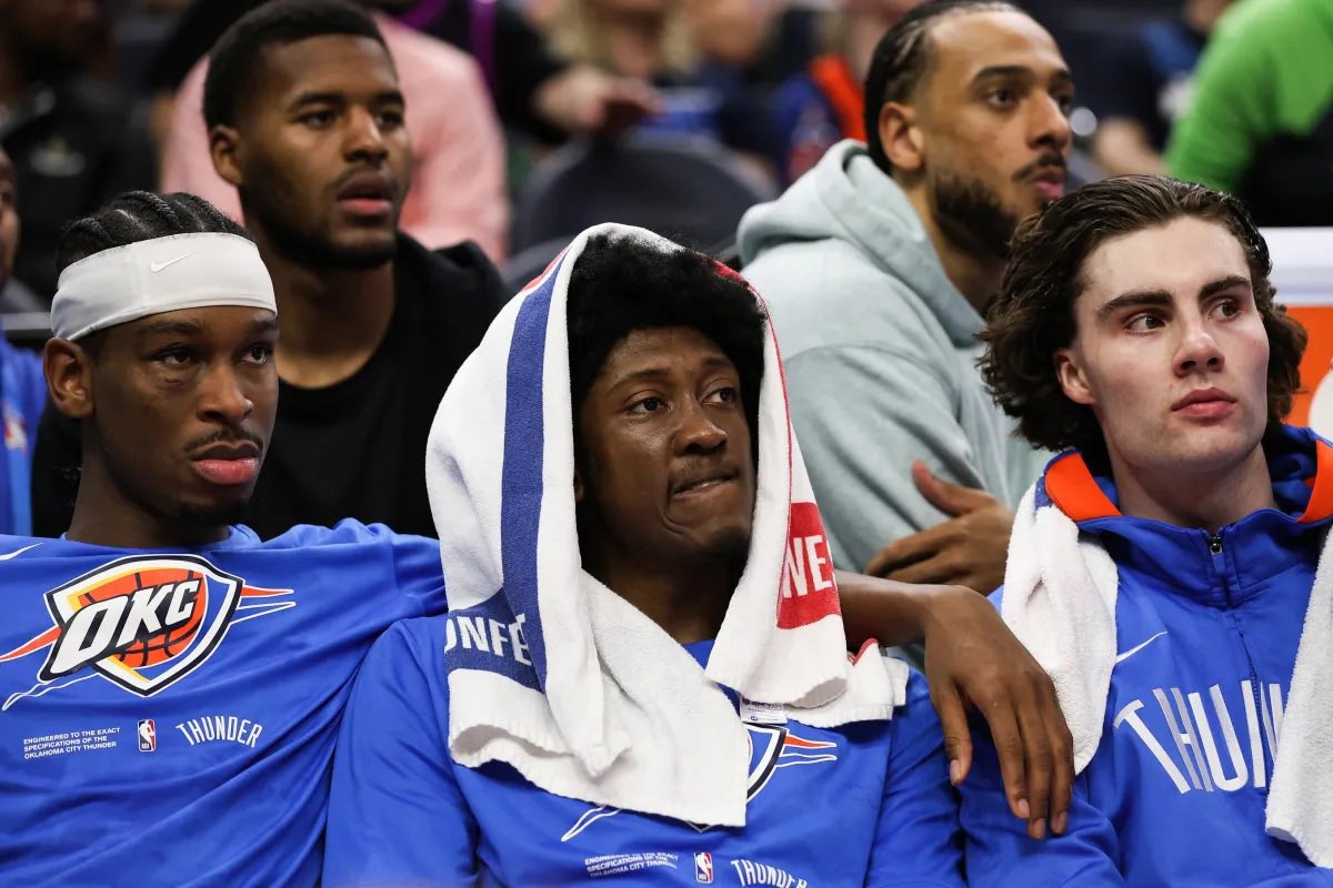UofBasketball's tweet photo. ‘23-‘24 Oklahoma City Thunder 

SGA—25
Josh Giddey—20
Lu Dort—24
Jalen Williams—22
Chet Holmgren—21

Kenrich Williams—28
Jaylin Williams—21
Isaiah Joe—24
Tre Mann—22
Cason Wallace—19
Ousmane Dieng—20
Vaslilije Micic—25
Aleksej Pokusevski—21

Expectations for this squad? https://t.co/CcmK1xneC3