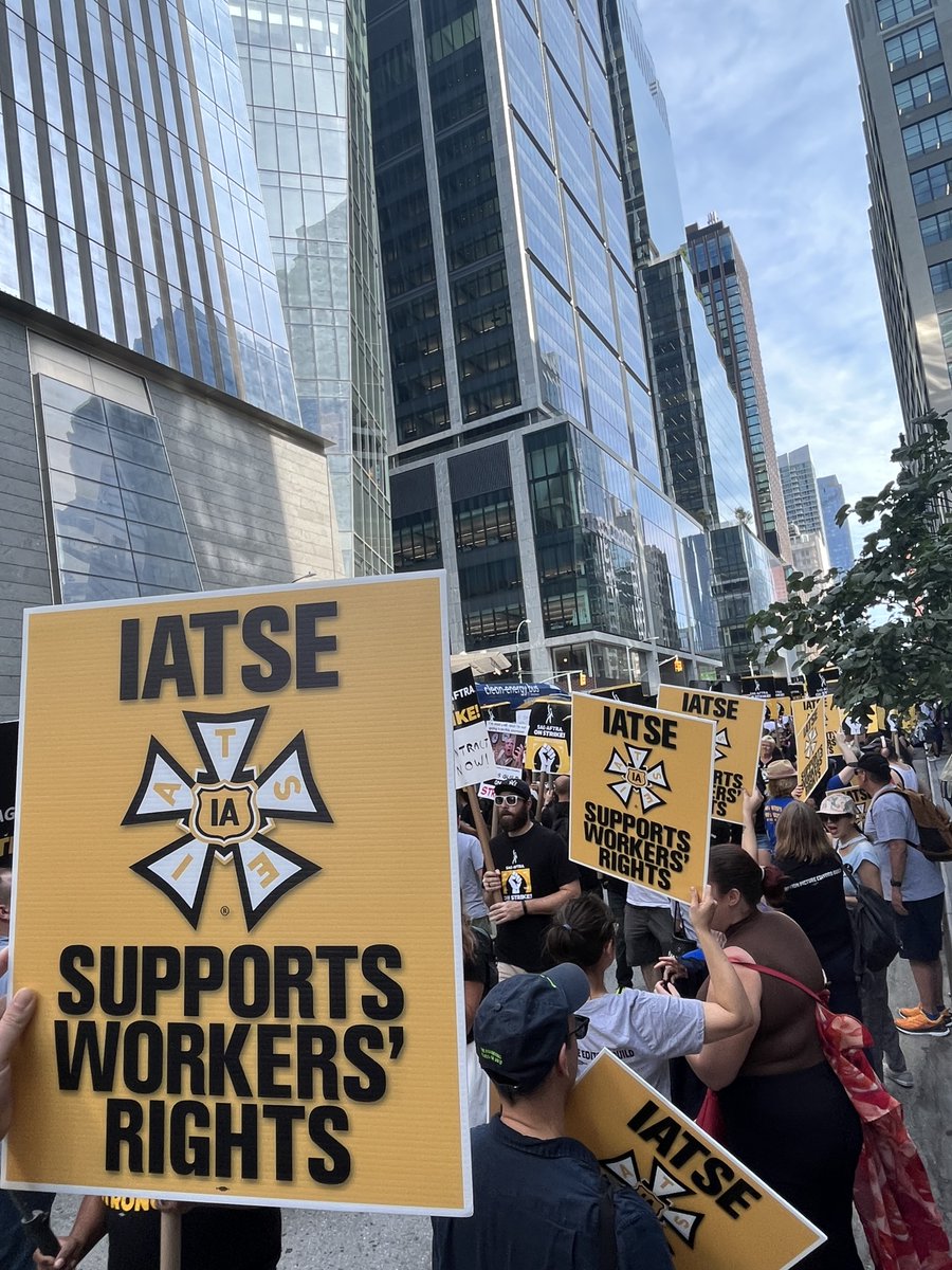 IATSE's tweet photo. IATSE kin stand unequivocally with @sagaftra, @WGAWest and @WGAEast members on this National Day of Solidarity!! ✊🪧 https://t.co/pyik94XBSm
