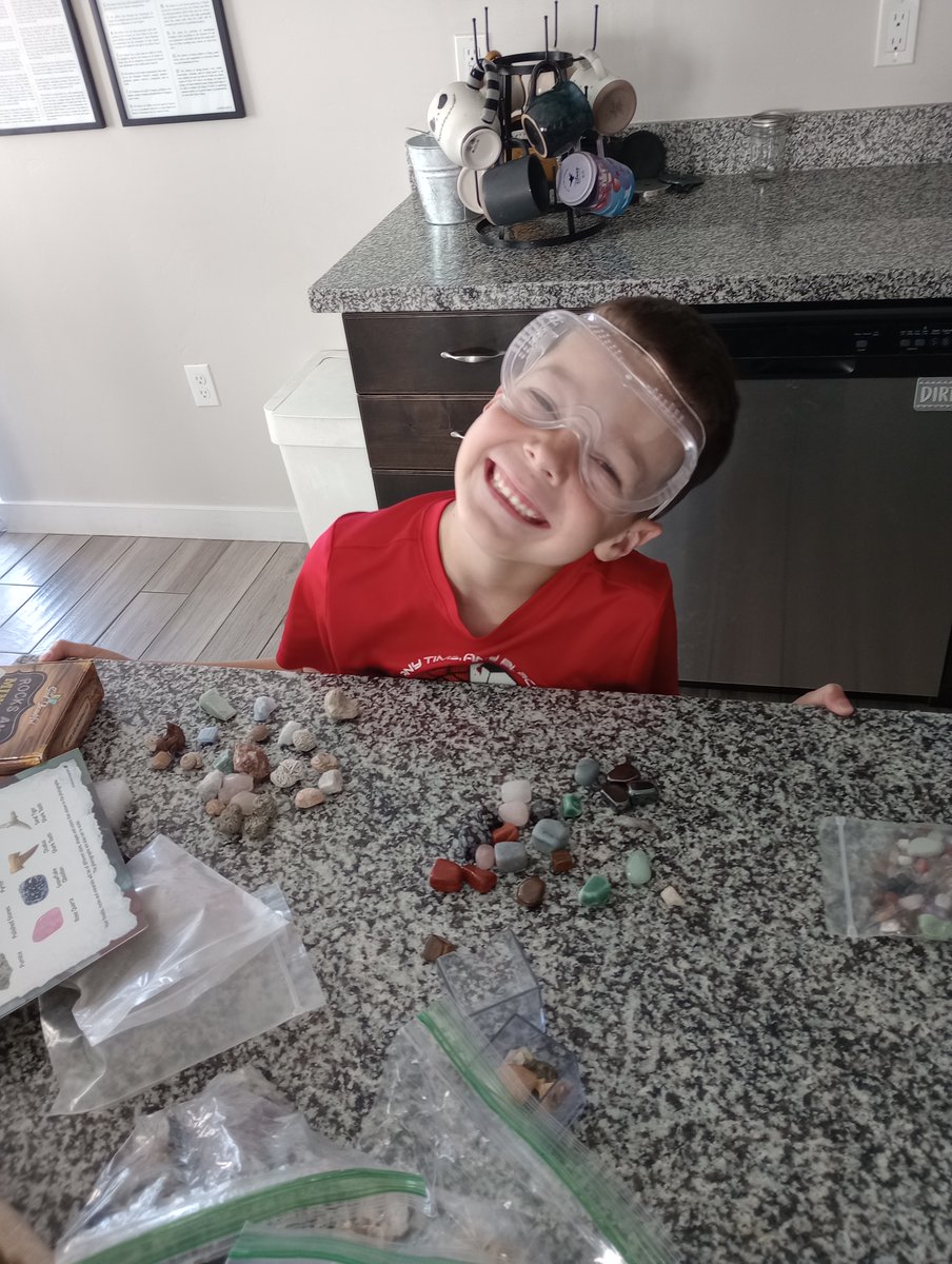 This is education. He told us that he is a scientist today, and yes he is, exploring his rock collection and learning about weather, erosion, and deposition.